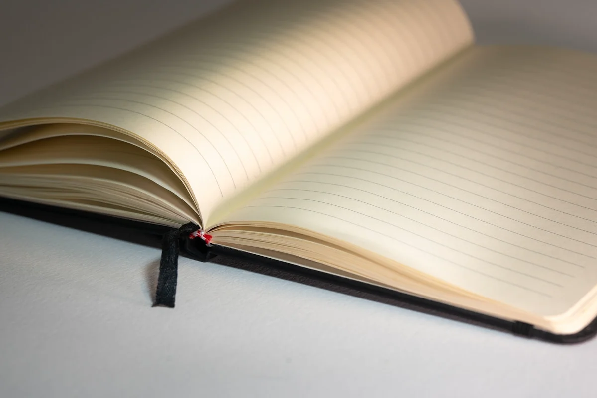 A close-up of a journal notebook ready for writing